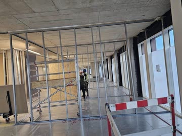 Gyproc plasterboard fixed to partition frames