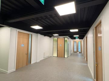 Finished corridor with doors at the Newman Building, UCD